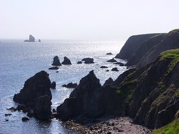 Picture of cliffs against the sun