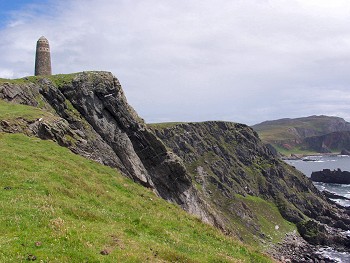 Picture of the cliffs with the monument in the background
