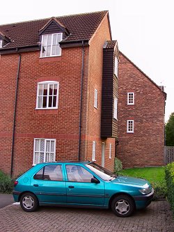 Picture of my car in front of my house